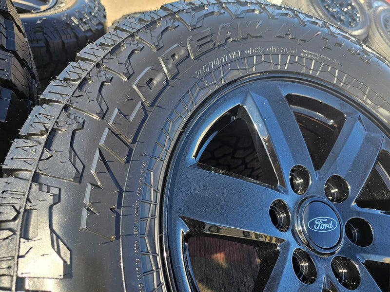 17" Ford F-150 OEM black Tremor rims wheels tires 10339 A/T4 2024 2025 2026 NEW Texas Truck Tire