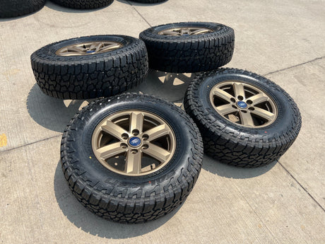 17" Ford F-150 OEM BRONZE Tremor rims wheels tires 10339 FALKEN A/T3 NEW Texas Truck Tire