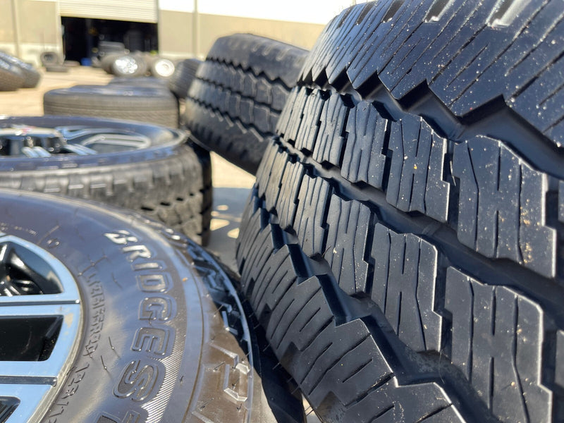 20" GMC Sierra AT4 2500 3500 OEM wheels rims 5950 Silverado BRIDGESTONE A/T Texas Truck Tire