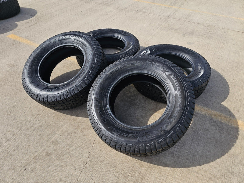 (4) 265/70/18 Cooper Discoverer Snow Claw LT 10 ply load range E tires Texas Truck Tire