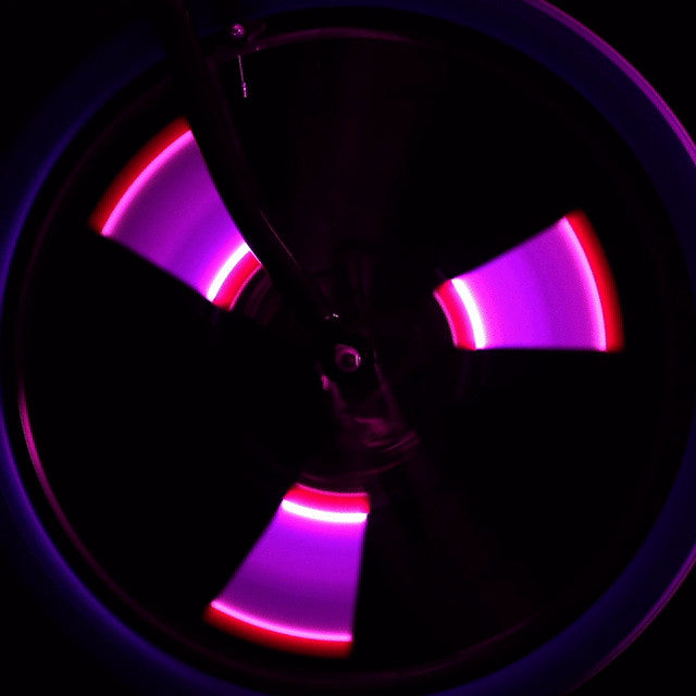 Pink Battery-Powered LED Spin Lights for Kids' Bikes and Ride-Ons