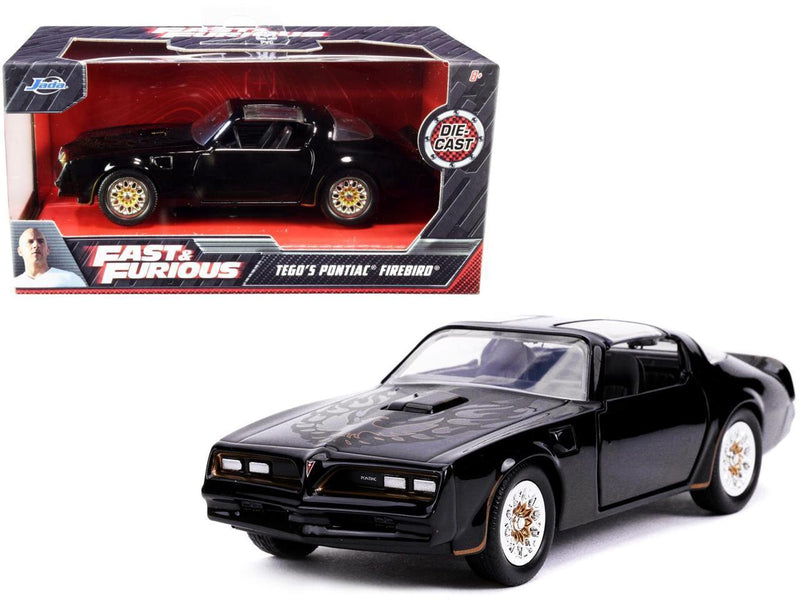 Black Pontiac Firebird Toy Car with Gold Stripes and Hood Bird Decal - Fast & Furious S Model