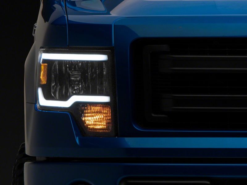 Raxiom 09-14 Ford F-150 Axial Series Headlights w/ LED Bar- Blk Housing (Clear Lens)