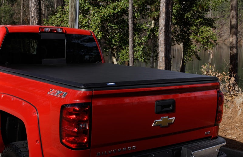 Lund 15-17 Chevy Silverado 3500 Fleetside (6.6ft. Bed) Hard Fold Tonneau Cover - Black