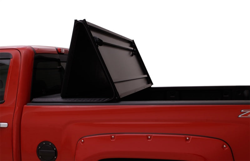 Lund 04-14 Chevy Colorado Styleside (5ft. Bed) Hard Fold Tonneau Cover - Black