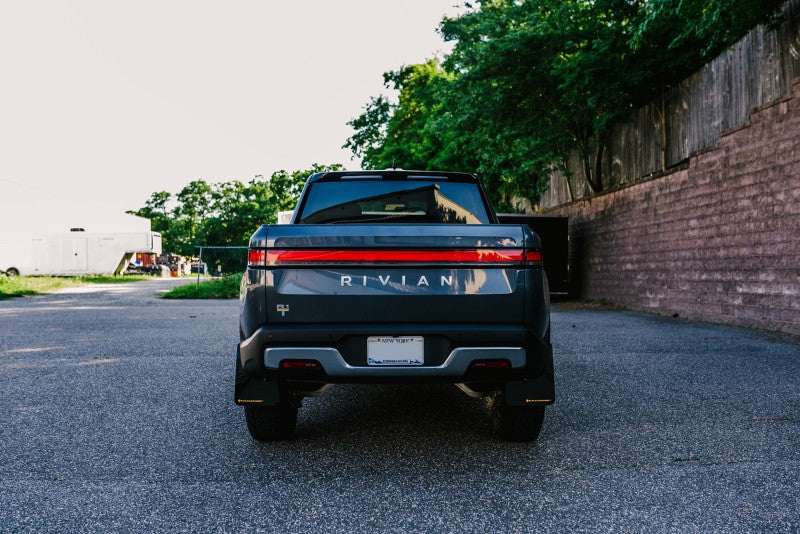 Rally Armor 2022 Rivian R1T Black UR Mud Flap w/ Tangerine Scream Logo