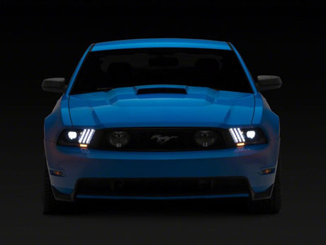 Raxiom 10-12 Ford Mustang LED Projector Headlights SEQL Turn Signals- Blk Housing (Clear Lens)