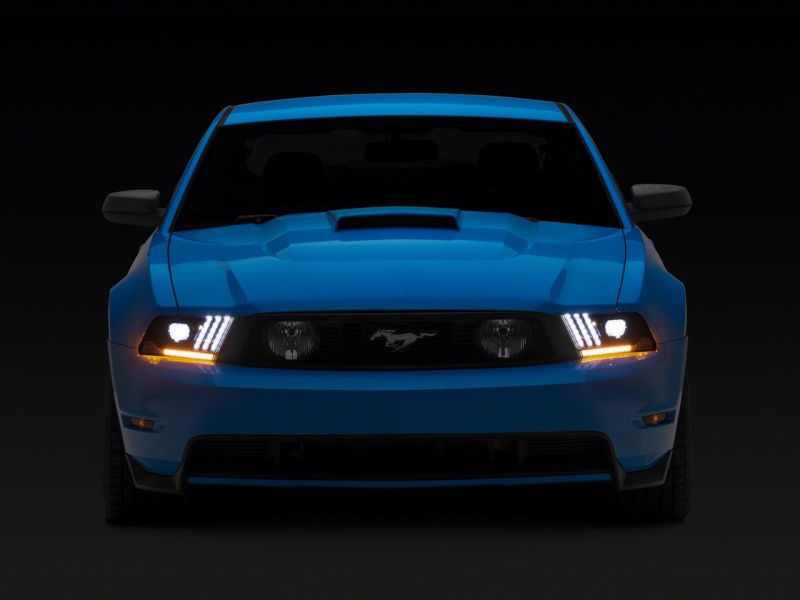 Raxiom 10-12 Ford Mustang LED Projector Headlights SEQL Turn Signals- Blk Housing (Clear Lens)