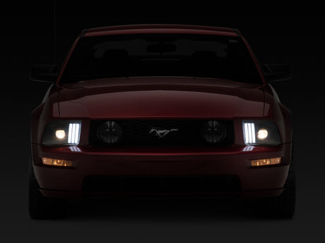 Raxiom 05-09 Ford Mustang w/ Halogen Prjctor Headlights- Black Housing (Clear Lens) (No GT500 )