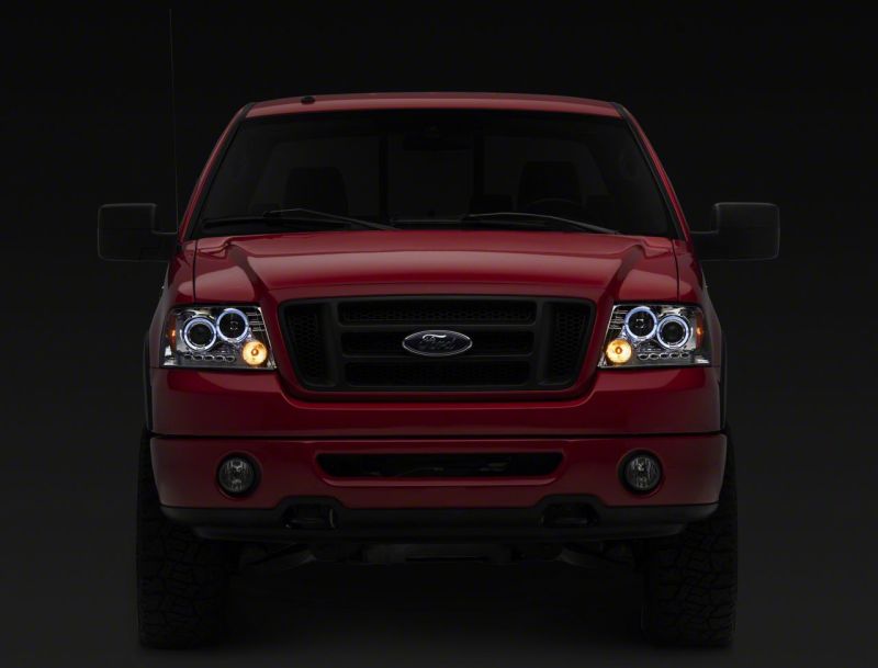 Raxiom 04-08 Ford F-150 Dual LED Halo Projector Headlights- Chrome Housing (Clear Lens)