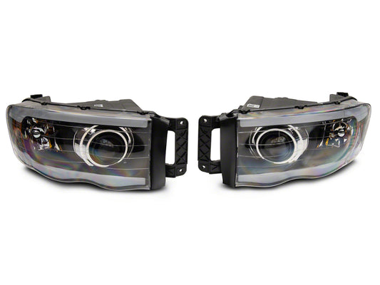 Raxiom 02-05 Dodge RAM 1500/2500/3500 Axial LED Projector Headlights- Blk Housing (Clear Lens)