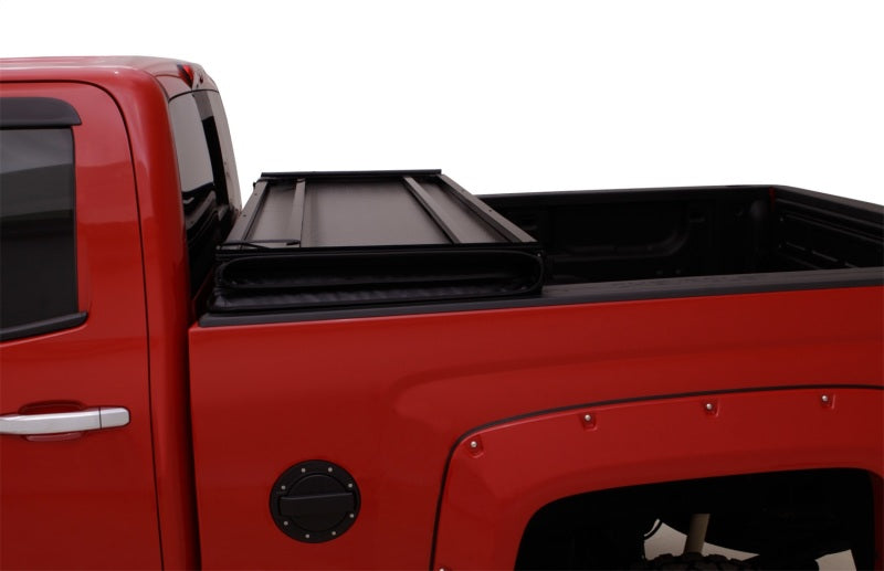 Lund 04-15 Nissan Titan (6.7ft. Bed) Hard Fold Tonneau Cover - Black