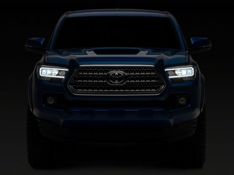 Raxiom 16-23 Toyota Tacoma w/ Factory Halogen DRL LED Headlights- Blk Housing (Clear Lens)