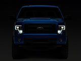 Raxiom 09-14 Ford F-150 Axial G4 Light Bar Switchback Projector Headlights- Blk Housing (Clear Lens)