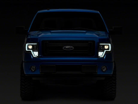 Raxiom 09-14 Ford F-150 Axial G4 Light Bar Switchback Projector Headlights- Blk Housing (Clear Lens)