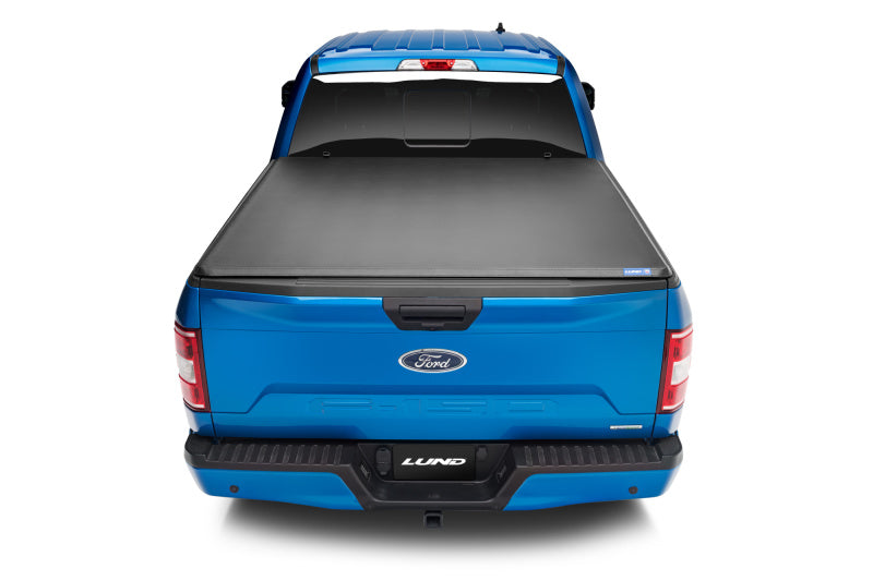 Lund 05-10 Dodge Dakota Fleetside (6.5ft. Bed) Hard Fold Tonneau Cover - Black