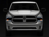 Raxiom 09-18 Dodge RAM 1500/2500/3500 Axial Headlights w/ SEQL LED Bar- Blk Housing (Clear Lens)