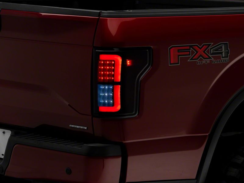 Raxiom 15-17 Ford F-150 Axial Series LED Tail Lights- Blk Housing (Smoked Lens)