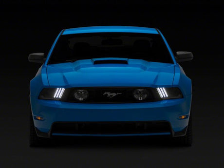 Raxiom 10-12 Ford Mustang LED Projector Headlights SEQL Turn Signals- Blk Housing (Clear Lens)