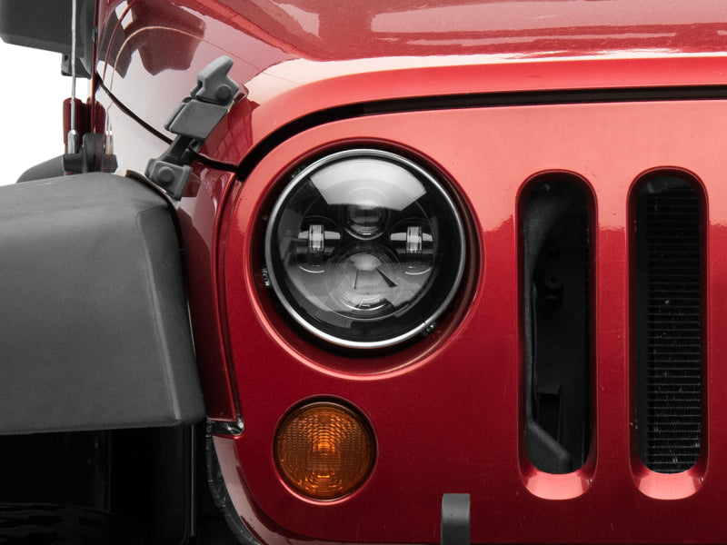 Raxiom 97-18 Jeep Wrangler TJ/JK Axial Series LED Daymaker Headlights- Black Housing (Clear Lens)