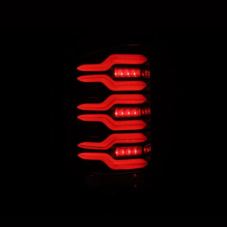 AlphaRex 14-18 GMC Sierra 1500/2500HD/3500HD LUXX-Series LED Tail Lights Alpha-Blk Actv Lgt Seq. Sig