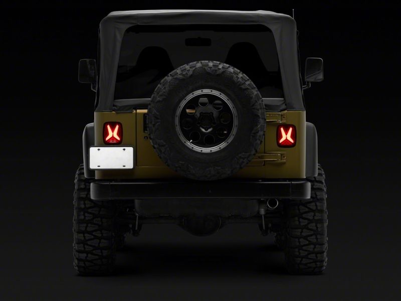 Raxiom 76-06 Jeep CJ7 Wrangler YJ & TJ Gladiator LED Tail Lights- Blk Housing (Smoked Lens)